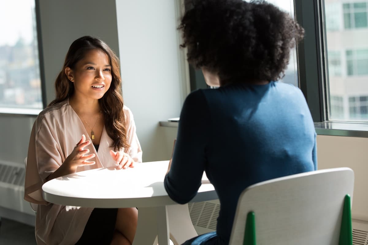 An advisor and a client talking through a tax matter